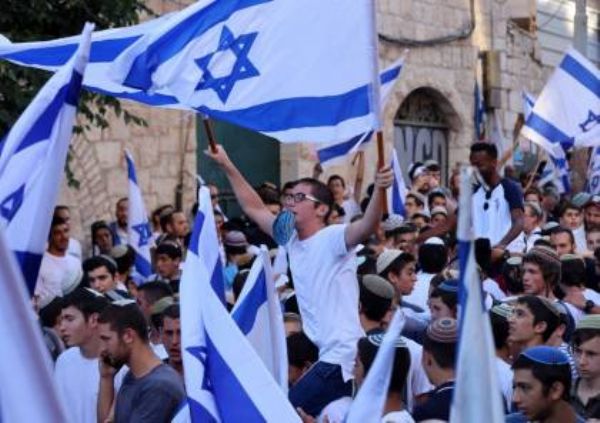 على خلفية مسيرة الأعلام .. اسرائيل تمرر رسالة لحماس